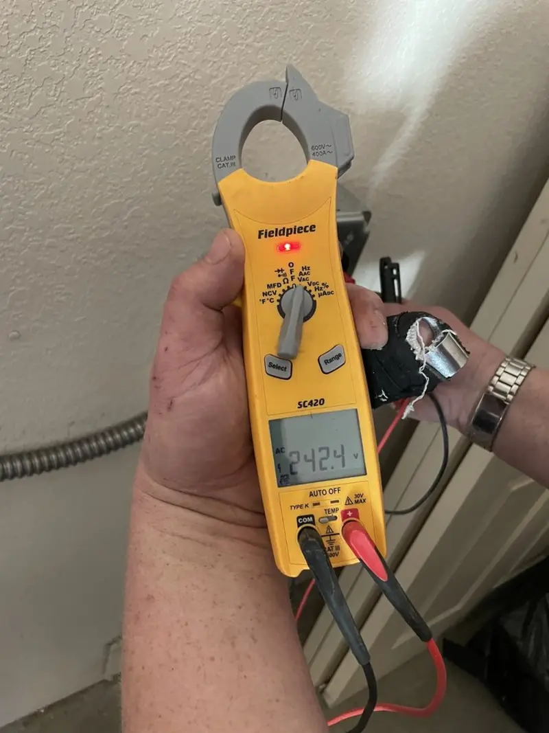 Voltage testing with clamp meter during Circuit Breaker Repair in Lower Saucon